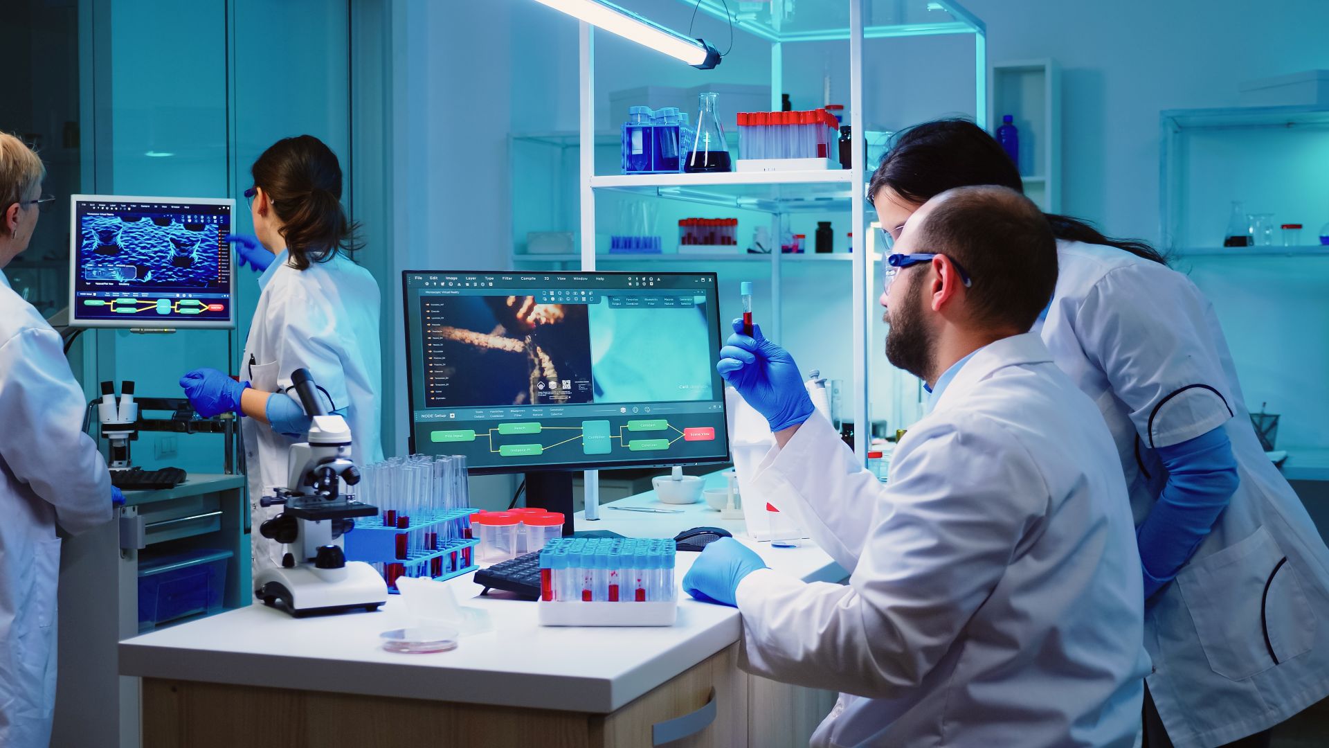 microbiologist-doctor-taking-blood-sample-tube-from-rack-with-machines-analysis-lab-background92