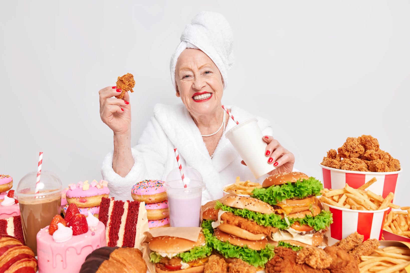 unhealthy-overeating-lifestyle-pleased-old-lady-smiles-positively-drinks-soda-eats-fast-food92